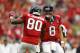 Oct 21, 2012; Houston, TX, USA; Houston Texans quarterback Matt Schaub (8) and wide receiver Andre Johnson (80) celebrate a touchdown against the Baltimore Ravens during the second half at Reliant Stadium. Mandatory Credit: Thomas Campbell-US PRESSWIRE