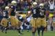 SOUTH BEND, IN - OCTOBER 20: Manti T'eo #5 of the Notre Dame Fighting Irish celebrates with Dan Fox #48 (L) and Matthias Farley #41 after intercepting a pass against of the BYU Cougars at Notre Dame Stadium on October 20, 2012 in South Bend, Indiana. Niotre Dame defeated BYU 17-14. (Photo by Jonathan Daniel/Getty Images)