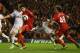 LIVERPOOL, ENGLAND - OCTOBER 31: Nathan Dyer of Swansea City tangles with Jack Robinson and Luis Suarez of Liverpool during the Capital One Cup Fourth Round match between Liverpool and Swansea City at Anfield on October 31, 2012 in Liverpool, England. (Photo by Clive Brunskill/Getty Images)