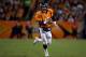 DENVER, CO - OCTOBER 28: Quarterback Peyton Manning #18 of the Denver Broncos runs with the ball during a game against the New Orleans Saints at Sports Authority Field Field at Mile High on October 28, 2012 in Denver, Colorado. (Photo by Justin Edmonds/Getty Images)