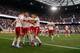 HARRISON, NJ - JUNE 24: Brandon Barklage #25 of the New York Red Bulls is mobbed by his teammates after scoring his first of two goals against the D.C. United at Red Bull Arena on June 24, 2012 in Harrison, New Jersey. Red Bulls defeated the DC United 3-2. (Photo by Mike Stobe/Getty Images for New York Red Bulls)