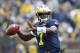 ANN ARBOR, MI - APRIL 16: Devin Gardner #7 of the Michigan Wolverines drops back to pass during the annual Spring Game at Michigan Stadium on April 16, 2011 in Ann Arbor, Michigan. (Photo by Leon Halip/Getty Images)