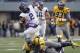 MORGANTOWN, WV - NOVEMBER 03: Trevone Boykin #2 of the TCU Horned Frogs carries the ball against the West Virginia Mountaineers during the game on November 3, 2012 at Mountaineer Field in Morgantown, West Virginia. TCU defeated WVU in two overtimes 39-38. (Photo by Justin K. Aller/Getty Images)