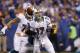 INDIANAPOLIS, IN - NOVEMBER 04: Ryan Tannehill #17 of the Miami Dolphins loses the ball after being hit by Dwight Freeney #93 of the Indianapolis Colts during the game at Lucas Oil Stadium on November 4, 2012 in Indianapolis, Indiana. (Photo by Joe Robbins/Getty Images)