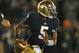 SOUTH BEND, IN - NOVEMBER 03: Everett Golson #5 of the Notre Dame Fighting Irish rolls out before throwing a touchdown pass against the Pittsburgh Panthers at Notre Dame Stadium on November 3, 2012 in South Bend, Indiana. Notre Dame defeated Pittsburgh 29-26 in triple overtime. (Photo by Jonathan Daniel/Getty Images)