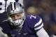 MANHATTAN, KS - NOVEMBER 03: Quarterback Collin Klein #7 of the Kansas State Wildcats gets up slowly after being hit on a running play against the Oklahoma State Cowboys in the third quarter at Bill Snyder Family Football Stadium on November 3, 2012 in Manhattan, Kansas. (Photo by Ed Zurga/Getty Images)