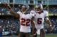 OAKLAND, CA - NOVEMBER 04: Doug Martin #22 and Josh Freeman #5 of the Tampa Bay Buccaneers celebrate after Martin scored a touchdown against the Oakland Raiders at O.co Coliseum on November 4, 2012 in Oakland, California. (Photo by Ezra Shaw/Getty Images)