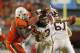 MIAMI GARDENS, FL - NOVEMBER 01: Logan Thomas #3 of the Virginia Tech Hokies is sacked by Olsen Pierre #91 of the Miami Hurricanes on November 1, 2012 at Sun Life Stadium in Miami Gardens, Florida. The Hurricanes defeated the Hokies 30-12. (Photo by Joel Auerbach/Getty Images)