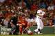 BOSTON, MA - AUGUST 23: Jacoby Ellsbury #2 of the Boston Red Sox watches the ball after hitting the go-ahead RBI single in the 8th inning against the Los Angeles Angels of Anaheim during the game on August 23, 2012 at Fenway Park in Boston, Massachusetts. (Photo by Jared Wickerham/Getty Images)
