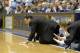 DURHAM, NC - FEBRUARY 9: Head coach Mike Krzyzewski and assistant coach Steve Wojciechowski (R) of the Duke Blue Devils slap the floor to signal defense during their game against the North Carolina Tar Heels at Cameron Indoor Stadium on February 9, 2005 in Durham, North Carolina. Duke defeated North Carolina 71-70. (Photo by Craig Jones/Getty Images)