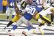 Nov 4, 2012; East Rutherford, NJ, USA; New York Giants wide receiver Victor Cruz (80) is hit in the end zone by Pittsburgh Steelers free safety Ryan Clark (25) during the game at Met Life Stadium. Mandatory Credit: William Perlman/THE STAR-LEDGER via US PRESSWIRE