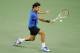 SHANGHAI, CHINA - OCTOBER 12: Roger Federer of Switzerland returns a shot to Marin Cilic of Croatia during the Men's Single Quarterfinals of the Shanghai Rolex Masters at the Qi Zhong Tennis Center on October 12, 2012 in Shanghai, China. (Photo by Lintao Zhang/Getty Images)