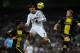 MADRID, SPAIN - NOVEMBER 3: Cristiano Ronaldo of Real Madrid CF competes for the ball with Alvaro Gonzalez Soberon of Real Zaragoza and his teammate Glenn Loovens during the La Liga match between Real Madrid CF and Real Zaragoza at Estadio Santiago Bernabeu on November 3, 2012 in Madrid, Spain. (Photo by Gonzalo Arroyo Moreno/Getty Images)