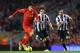 LIVERPOOL, ENGLAND - NOVEMBER 04: Fabrizio Coloccini of Newcastle United competes with Luis Suarez of Liverpool during the Barclays Premier League match between Liverpool and Newcastle United at Anfield on November 4, 2012 in Liverpool, England. (Photo by Alex Livesey/Getty Images)