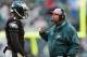 Oct 28, 2012; Philadelphia, PA, USA; Philadelphia Eagles offensive coordinator Marty Mornhinweg talks with quarterback Michael Vick (7) during the fourth quarter against the Atlanta Falcons at Lincoln Financial Field. The Falcons defeated the Eagles 30-17. Mandatory Credit: Howard Smith-US PRESSWIRE