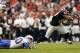 Nov 4, 2012; Houston, TX, USA; Houston Texans wide receiver Andre Johnson (80) runs past Buffalo Bills outside linebacker Nick Barnett (50) during the second half at Reliant Stadium. The Texans won 21-9. Mandatory Credit: Thomas Campbell-US PRESSWIRE