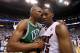 MIAMI, FL - MAY 11: Mario Chalmers #15 of the Miami Heat is congratulated by Ray Allen #20 of the Boston Celtics after Game Five of the Eastern Conference Semifinals of the 2011 NBA Playoffs at American Airlines Arena on May 11, 2011 in Miami, Florida. NOTE TO USER: User expressly acknowledges and agrees that, by downloading and/or using this Photograph, User is consenting to the terms and conditions of the Getty Images License Agreement. (Photo by Mike Ehrmann/Getty Images)