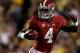 BATON ROUGE, LA - NOVEMBER 03: T.J. Yeldon #4 of Alabama carries the ball against LSU at Tiger Stadium on November 3, 2012 in Baton Rouge, Louisiana. (Photo by Matthew Stockman/Getty Images)