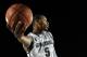 CORONADO, CA - NOVEMBER 11: Adreian Payne #5 of the Michigan State Spartans attempts to save a ball from going out of bounds in the game against the North Carolina Tar Heels during the Quicken Loans Carrier Classic on board the USS Carl Vinson on November 11, 2011 in Coronado, California. (Photo by Harry How/Getty Images)