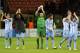 MILAN, ITALY - NOVEMBER 06: Malaga CF players applaud the fans at the end of the UEFA Champions League group C match between AC Milan and Malaga CF at Stadio Giuseppe Meazza on November 6, 2012 in Milan, Italy. (Photo by Claudio Villa/Getty Images)
