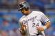 ST. PETERSBURG, FL - MAY 30: Outfielder Dayan Viciedo #24 of the Chicago White Sox scores a run against the Tampa Bay Rays May 30, 2012 at Tropicana Field in St. Petersburg, Florida. (The Sox won 4 - 3. Photo by Al Messerschmidt/Getty Images)