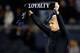 KANSAS CITY, KS - NOVEMBER 07: Goalkeeper Jimmy Nielsen #1 of Sporting KC hoists a scarf and applauds fans after the Eastern Conference Semifinal game against the Houston Dynamo at LiveStrong Sporting Park on November 7, 2012 in Kansas City, Kansas. (Photo by Jamie Squire/Getty Images)