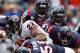 HOUSTON - DECEMBER 28: Matt Forte #22 of the Chicago Bears is hit by DeMeco Ryans of the Houston Texans during the first half at the Reliant Stadium on December 28, 2008 in Houston, Texas. The Texans won 31-24. (Photo by Harry How/Getty Images)