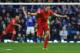 LIVERPOOL, ENGLAND - OCTOBER 28: Steven Gerrard of Liverpool celebrates the disallowed goal of Luis Suarez of Liverpool during the Barclays Premier League match between Everton and Liverpool at Goodison Park on October 28, 2012 in Liverpool, England. (Photo by Chris Brunskill/Getty Images)