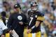 Sep 16, 2012; Pittsburgh , PA, USA; Pittsburgh Steelers quarterback Ben Roethlisberger (7) talks with offensive coordinator Todd Haley during the second half of the game against the New York Jets at Heinz Field. The Steelers won the game, 27-10. Mandatory Credit: Jason Bridge-US PRESSWIRE