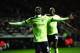 NEWCASTLE UPON TYNE, ENGLAND - OCTOBER 04: Newcastle player Papiss Cisse (front) and Shola Ameobi celebrate the third Newcastle goal during the UEFA Europa League match between Newcastle United and FC Girondins de Bordeaux at Sports Direct Arena on October 4, 2012 in Newcastle upon Tyne, England. (Photo by Stu Forster/Getty Images)