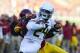 LOS ANGELES, CA - NOVEMBER 03: Kenjon Barner #24 of the Oregon Ducks gets tackled by Jawanza Sterling #29 of the USC Trojans at Los Angeles Memorial Coliseum on November 3, 2012 in Los Angeles, California. (Photo by Robert Laberge/Getty Images)