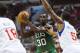 Oct 15, 2012; Philadelphia, PA, USA; Boston Celtics forward Brandon Bass (30) looks to pass as Philadelphia 76ers forward Arnett Moultrie (5) defends during the fourth quarter at the Wachovia Center. The Sixers defeated the Celtics 107-75. Mandatory Credit: Howard Smith-US PRESSWIRE