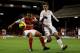 LONDON, ENGLAND - JANUARY 02: Francis Coquelin of Arsenal holds off Bryan Ruiz of Fulham during the Barclays Premier League match between Fulham and Arsenal at Craven Cottage on January 2, 2012 in London, England. (Photo by Clive Rose/Getty Images)