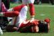 TAMPA, FL - OCTOBER 14: Running back Jamaal Charles #25 of the Kansas City Chiefs loses his helmet and is injured on the first play of the game against the Tampa Bay Buccaneers October 14, 2012 at Raymond James Stadium in Tampa, Florida. Chalres later returnd to play. (Photo by Al Messerschmidt/Getty Images)