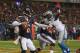CHICAGO, IL - OCTOBER 22: Jay Cutler #6 of the Chicago Bears looks for a receiver as Lawrence Jackson #94 of the Detroit Lions rushes against J'Marcus Webb #73 at Soldier Field on October 22, 2012 in Chicago, Illinois. The Bears defeated the Lions 13-7. (Photo by Jonathan Daniel/Getty Images)