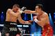 Nov 10, 2012; Hamburg, GERMANY; Wladimir Klitschko (red shorts) trades punches with Mariusz Wach during their bout at O2 World Arena. Mandatory Credit: Tim Groothuis/Witters Sport via US PRESSWIRE