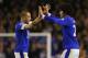LIVERPOOL, ENGLAND - NOVEMBER 10: Marouane Fellaini of Everton celebrates with John Heitinga after the Barclays Premier League match between Everton and Sunderland at Goodison Park on November 10, 2012 in Liverpool, England. (Photo by Alex Livesey/Getty Images)