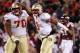 BLACKSBURG, VA - NOVEMBER 08: Quarterback EJ Manuel #3 of the Florida State Seminoles celebrates with offensive lineman Josue Matias #70 of the Seminoles after throwing the game-winning touchdown in the final minute against the Virginia Tech Hokies at Lane Stadium on November 8, 2012 in Blacksburg, Virginia. The Seminoles won 28-22. (Photo by Geoff Burke/Getty Images)