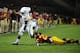 LOS ANGELES, CA - NOVEMBER 03: Kenjon Barner #24 of the Oregon Ducks runs away from Avery Patterson #21 of the USC Trojans at Los Angeles Memorial Coliseum on November 3, 2012 in Los Angeles, California. (Photo by Robert Laberge/Getty Images)