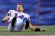 FOXBORO, MA - NOVEMBER 11: Ryan Fitzpatrick #14 of the Buffalo Bills reacts after fumbling the football in the second half against the New England Patriots at Gillette Stadium on November 11, 2012 in Foxboro, Massachusetts. (Photo by Jim Rogash/Getty Images)