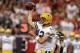 HOUSTON, TX - OCTOBER 14: Aaron Rodgers #12 of the Green Bay Packers passes the ball in the second quarter against the Houston Texans at Reliant Stadium on October 14, 2012 in Houston, Texas. (Photo by Scott Halleran/Getty Images)