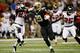 NEW ORLEANS, LA - NOVEMBER 11: Chris Ivory #29 of the New Orleans Saints runs past Dunta Robinson #23 of the Atlanta Falcons to score a touchdown at The Mercedes-Benz Superdome on November 11, 2012 in New Orleans, Louisiana. (Photo by Chris Graythen/Getty Images)