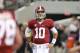 ARLINGTON, TX - SEPTEMBER 01: A J McCarron #10 of Alabama Crimson Tide warms up prior to the start of the game against Michigan Wolverines at Cowboys Stadium on September 1, 2012 in Arlington, Texas. (Photo by Leon Halip/Getty Images)