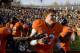 Nov 10, 2012; Charlottesville, VA, USA; Virginia Cavaliers tight end Jake McGee (83) celebrates on the field after beating the Miami Hurricanes 41-40 at Scott Stadium. McGee caught the game winning touchdown. Mandatory Credit: Peter Casey-US PRESSWIRE