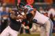 Jeff Backus, trying to block Julius Peppers