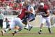 PALO ALTO, CA - OCTOBER 06: Quarterback Matt Scott #10 of the Arizona Wildcats is sacked by defensive end Ben Gardner #49 of the Stanford Cardinal during the second quarter at Stanford Stadium on October 6, 2012 in Palo Alto, California. (Photo by Jason O. Watson/Getty Images)