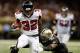 NEW ORLEANS, LA - NOVEMBER 11: Jacquizz Rodgers #32 of the Atlanta Falcons is tackled by Roman Harper #41 of the New Orleans Saints at The Mercedes-Benz Superdome on November 11, 2012 in New Orleans, Louisiana. The Saints defeated the Falcons 31-27. (Photo by Chris Graythen/Getty Images)