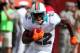 MIAMI GARDENS, FL - NOVEMBER 11: Running back Reggie Bush #22 of the Miami Dolphins runs against the Tennessee Titans at Sun Life Stadium on November 11, 2012 in Miami Gardens, Florida. (Photo by Marc Serota/Getty Images)
