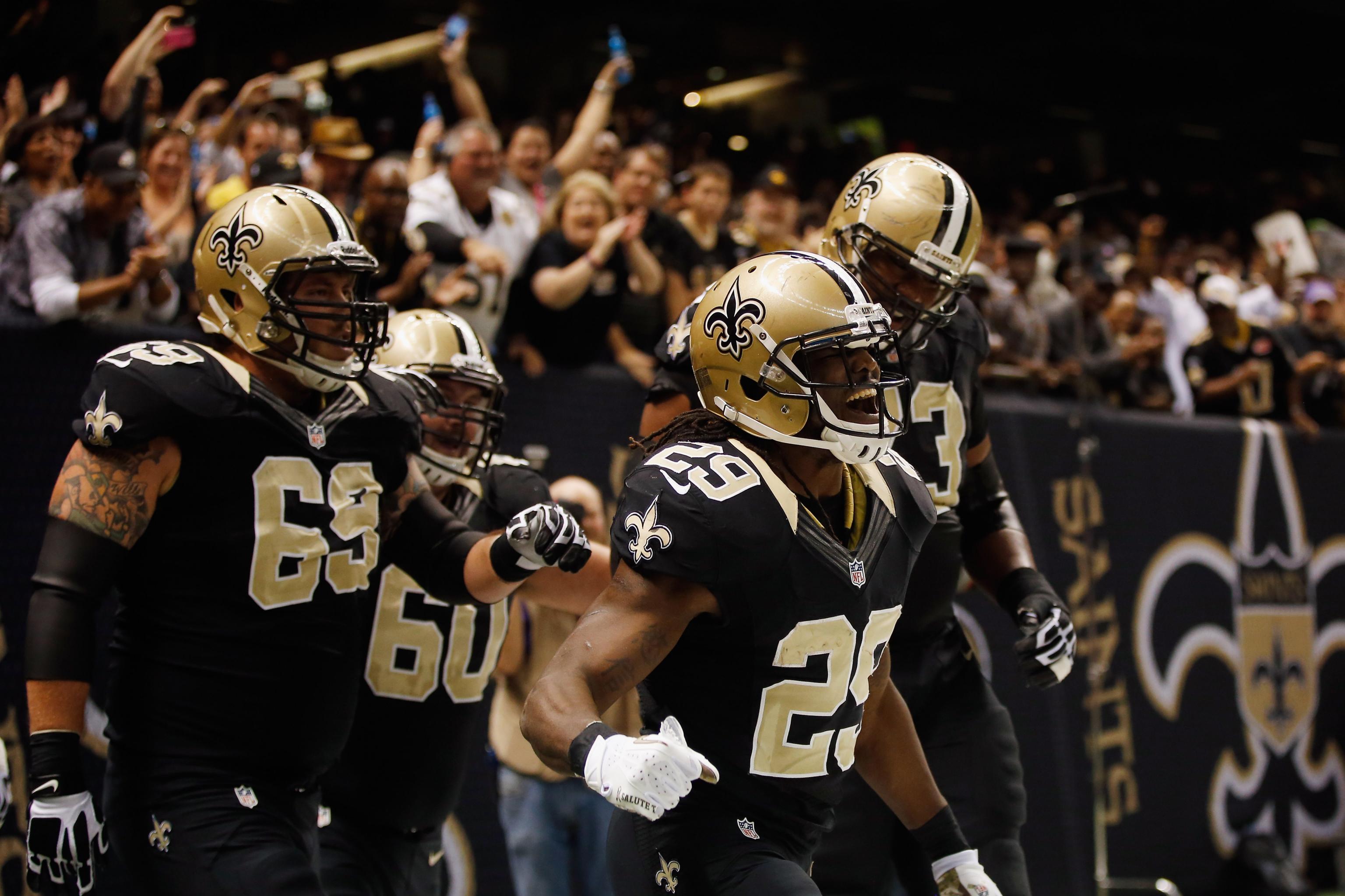 Nov 21, 2010: New Orleans Saints running back Chris Ivory (29) runs the  ball during game action between the New Orleans Saints and the Seattle  Seahawks at the Louisiana Superdome in New