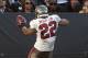 October 4, 2012; Oakland, CA, USA; Tampa Bay Buccaneers running back Doug Martin (22) celebrates in front of Oakland Raider fans after scoring a 70 yard touchdown during the fourth quarter at O.co Coliseum. Mandatory Credit: Ed Szczepanski-US PRESSWIRE